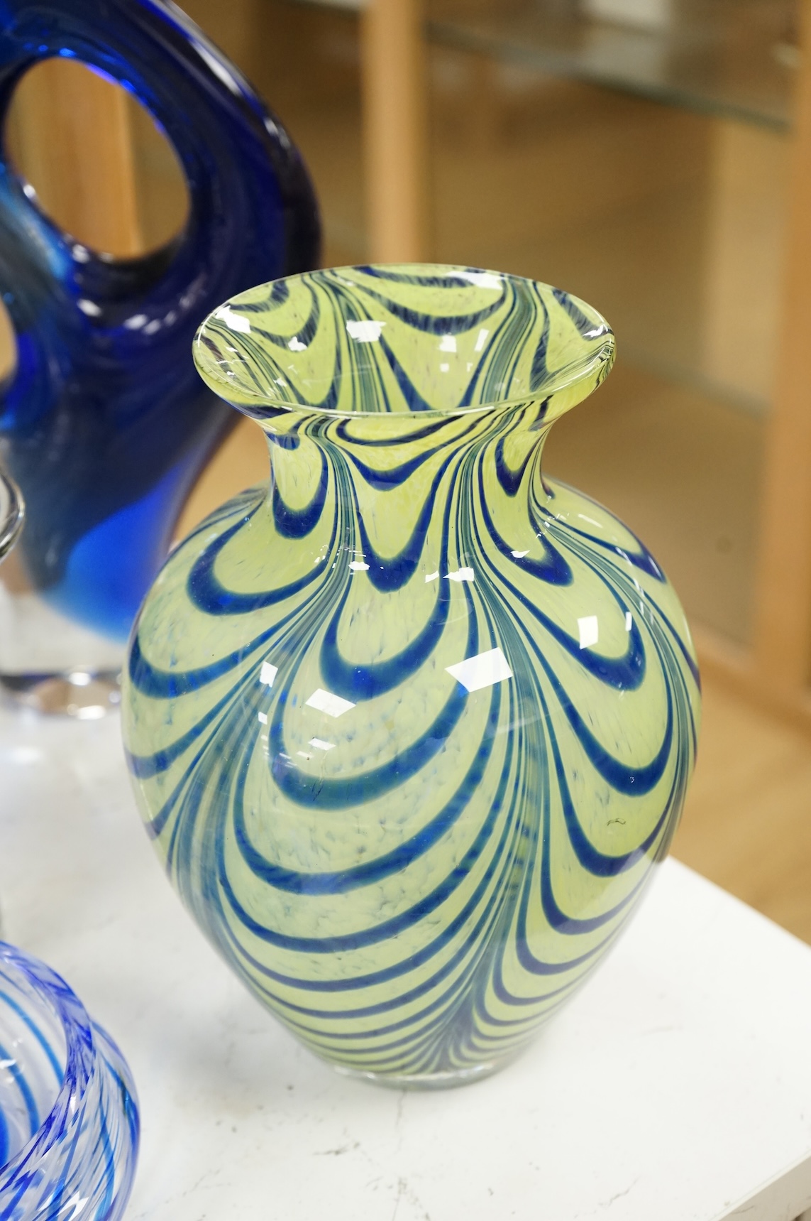 A collection of mid century and later art glass vases and ornaments, largest 39cm high